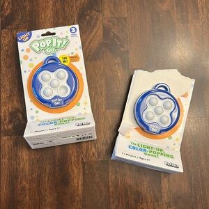 2 Buffalo Games Light-Up Pop Games, new in box